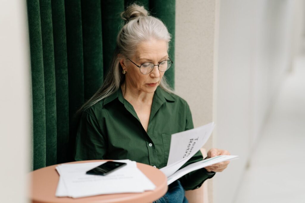Woman looking through papers