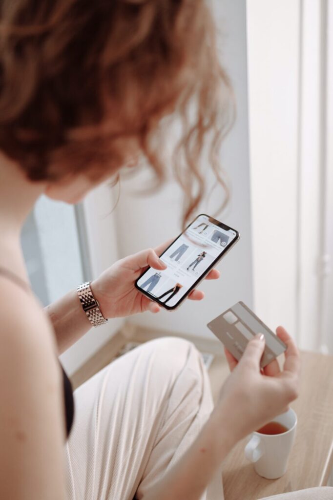 Woman making purchases on mobile phone